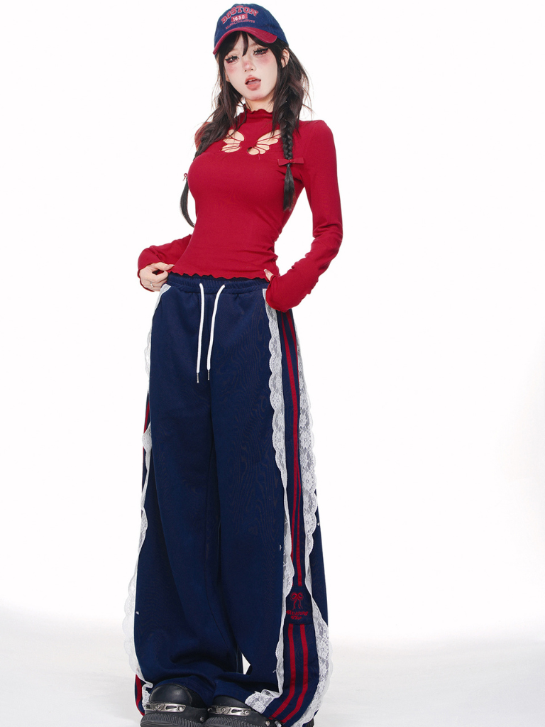 ワイルドカットアウトブラックレイヤートップス