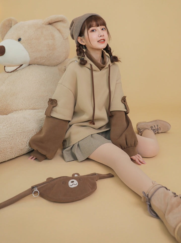 Faux two-piece sweater + bare waist pouch