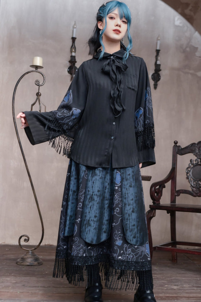 Blusa con borlas de lágrimas azules y encaje