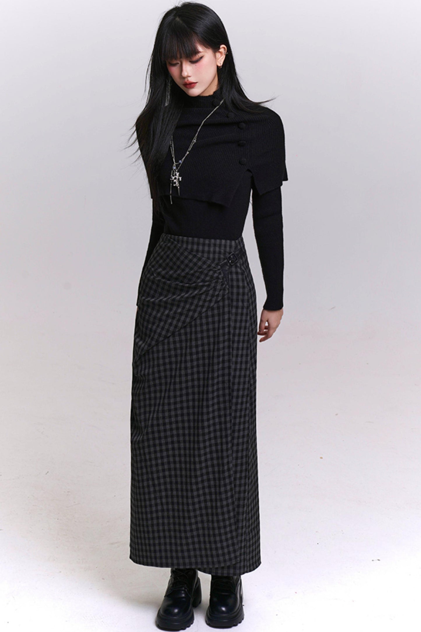 アトモスフェリックケープデザインニットトップ