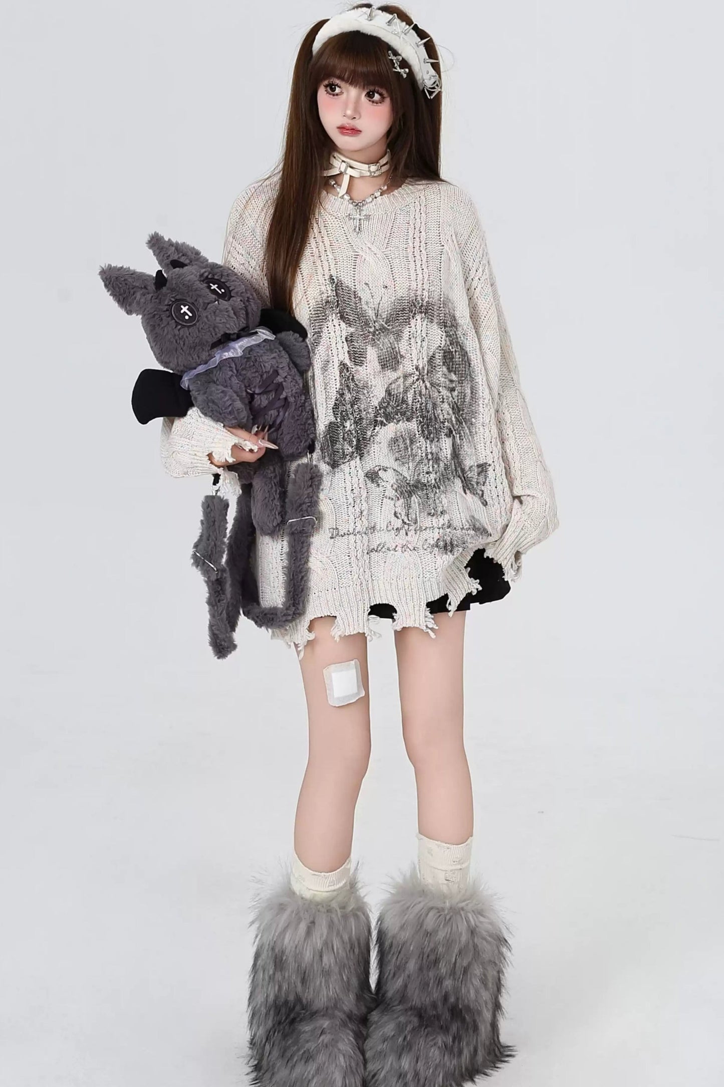 レイジールーズバタフライニットセーター