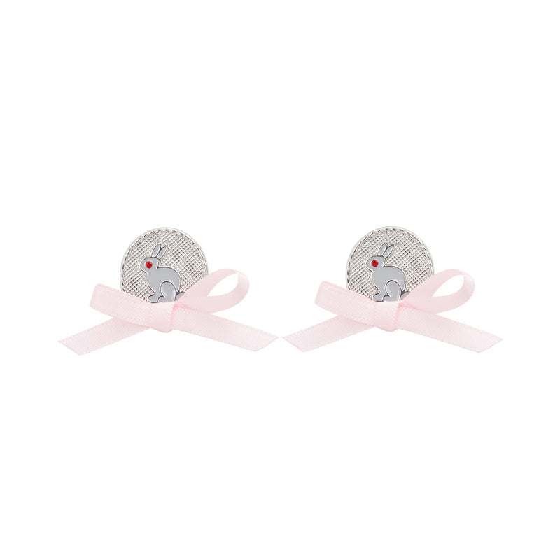 Boucles d'oreilles douces avec design de nœud de lapin