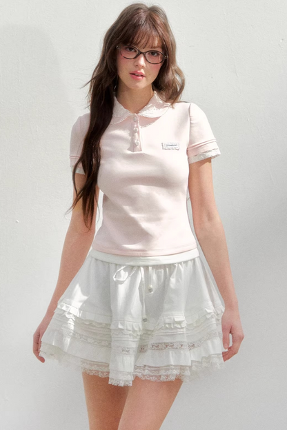 Blusa rosa con colletto ricamato