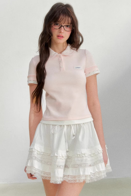 Blusa rosa con colletto ricamato