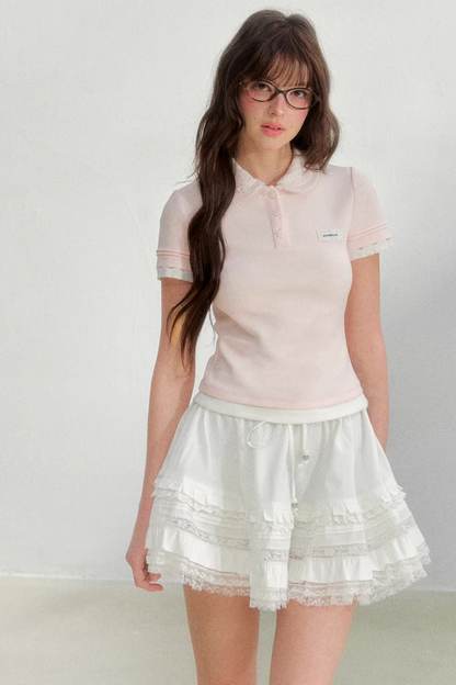 Blusa rosa con colletto ricamato