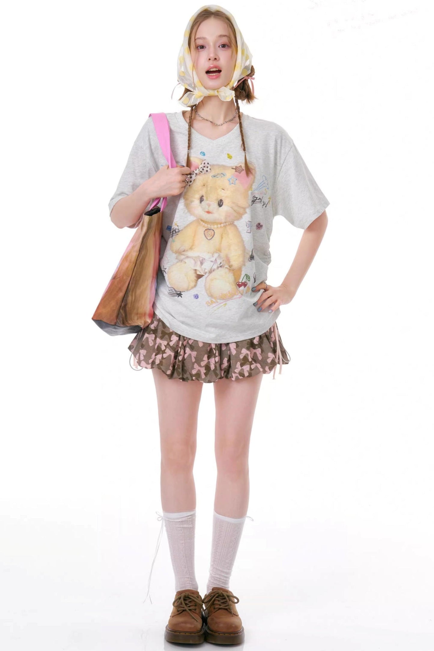 Top con scollo a V orsetti gommosi