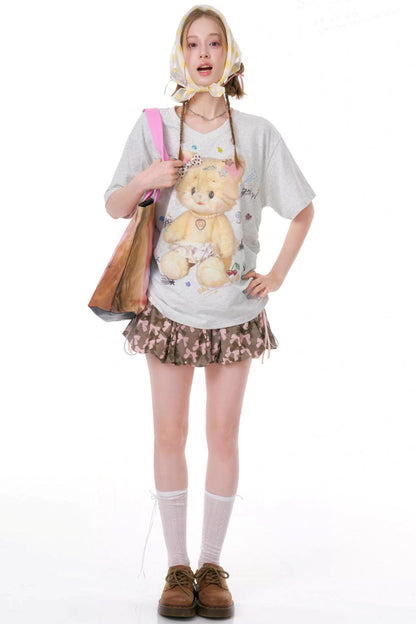 Top con scollo a V orsetti gommosi