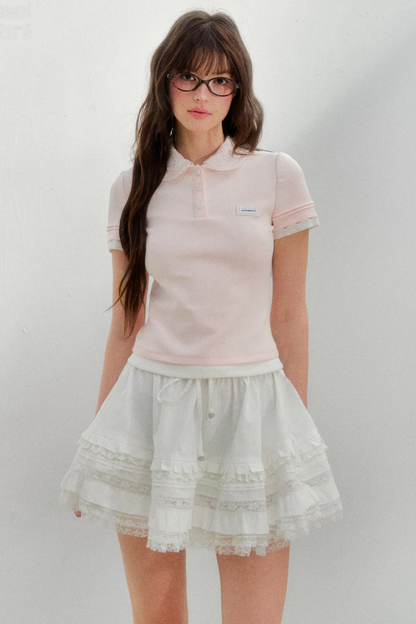 Blusa rosa con colletto ricamato