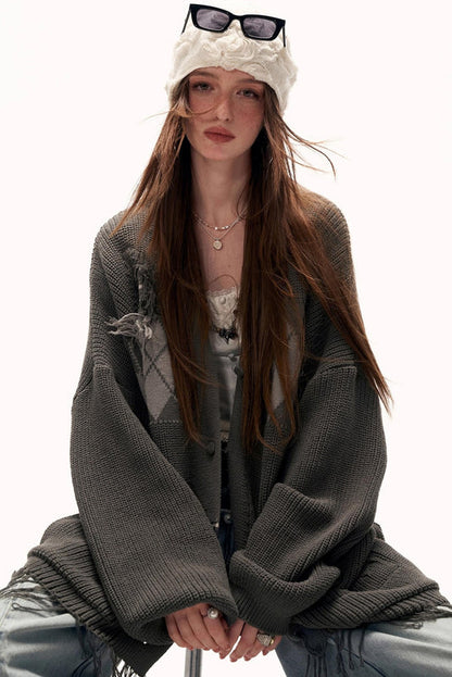 パッチワークタッセルニット