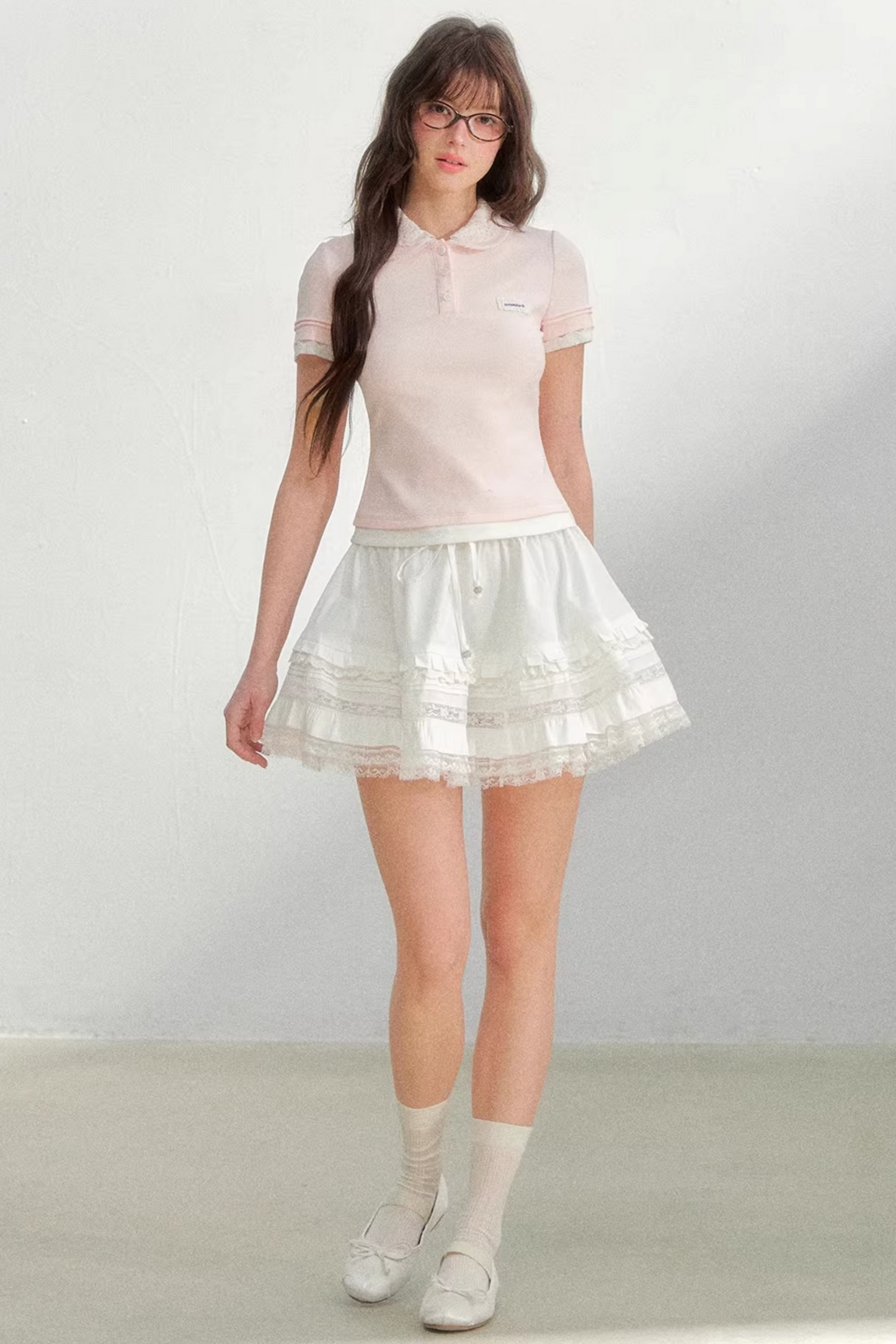 Blusa rosa con colletto ricamato