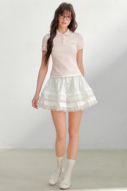 Blusa rosa con colletto ricamato