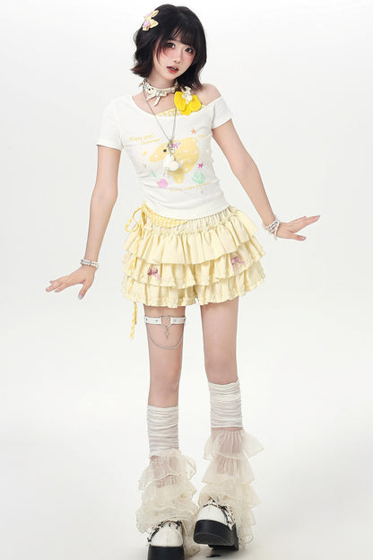 Haut d'été floral à épaules dénudées et effet deux-pièces à motif dauphin