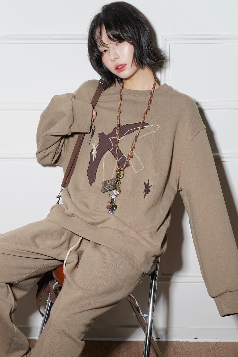 エンブロイダリーロングスリーブニットスウェット