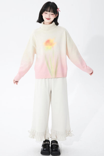 Soft pink gradient knit sweater