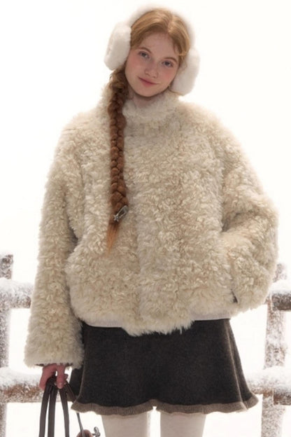 リバーシブルボリュームファーショートコート