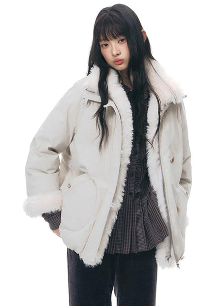 ラッフルダブルブレスタフリルトップス