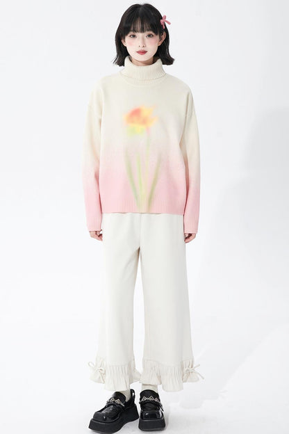 Soft pink gradient knit sweater