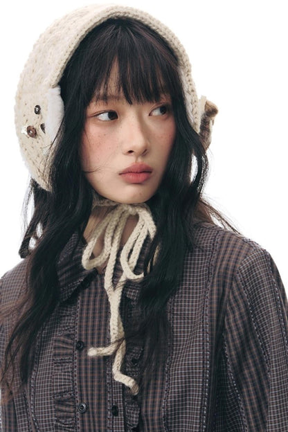 ラッフルダブルブレスタフリルトップス