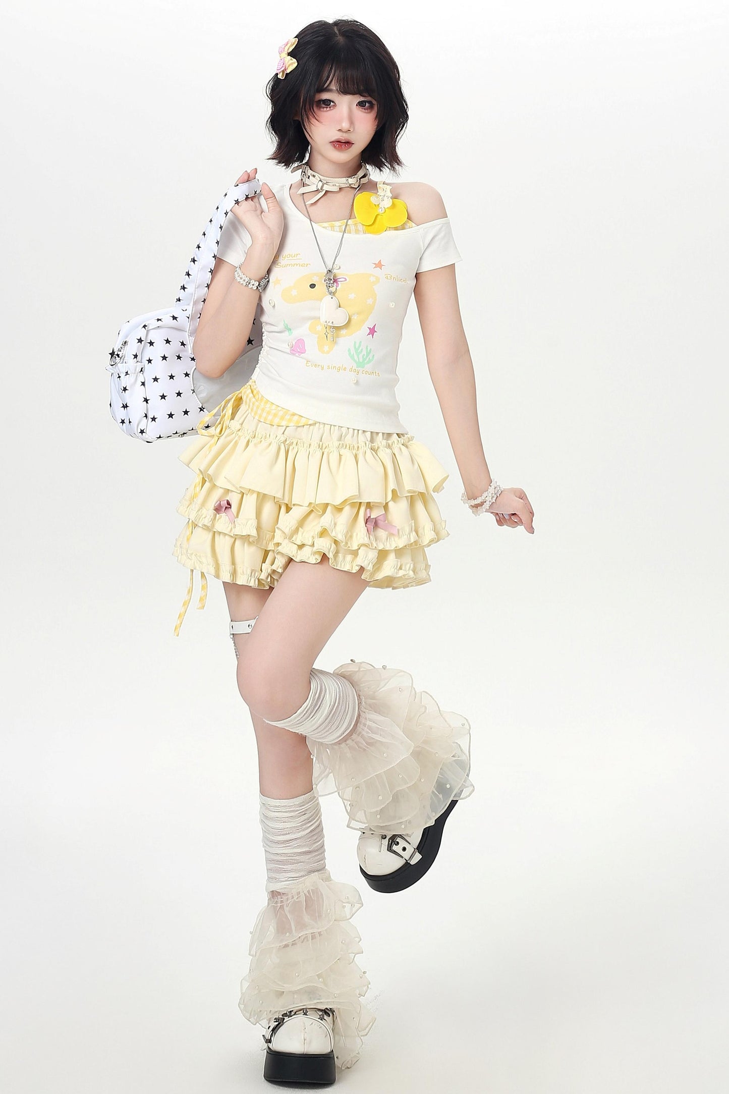 Haut d'été floral à épaules dénudées et effet deux-pièces à motif dauphin