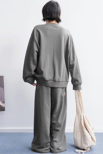 エンブロイダリーロングスリーブニットスウェット