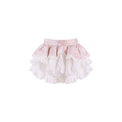 Top rosa elegante + gonna a balze bianca