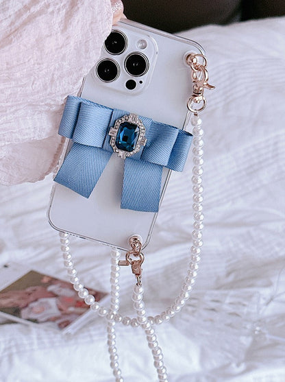 Étui pour téléphone portable avec chaîne de perles et strass et ruban bleu