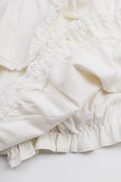 Ensemble robe-pull en maille rose à épaules dénudées