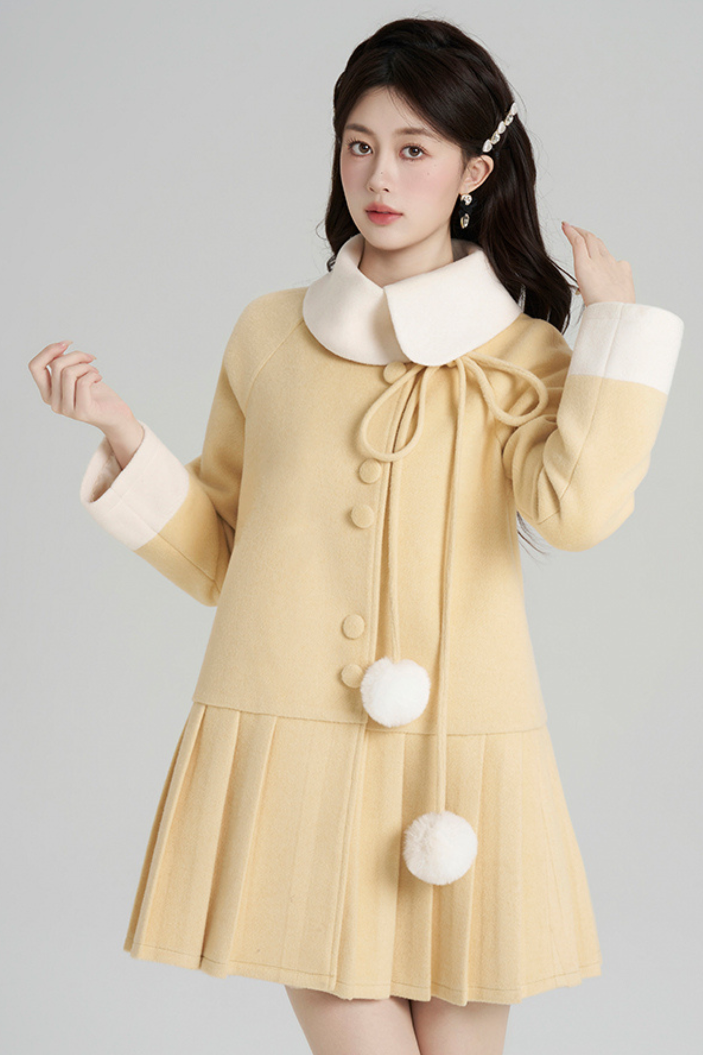 イエロープリーツウールコート