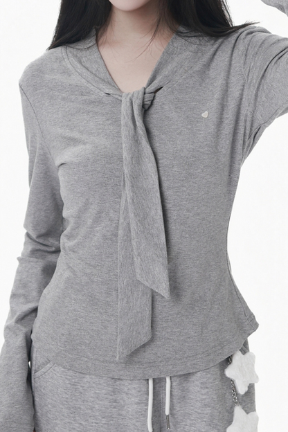 マルチカラーボタンリボントップス