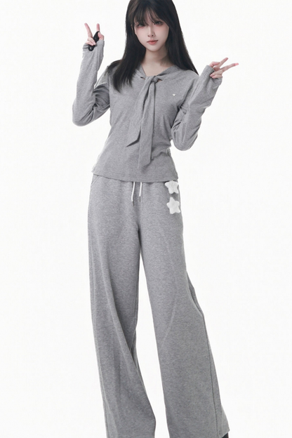 マルチカラーボタンリボントップス