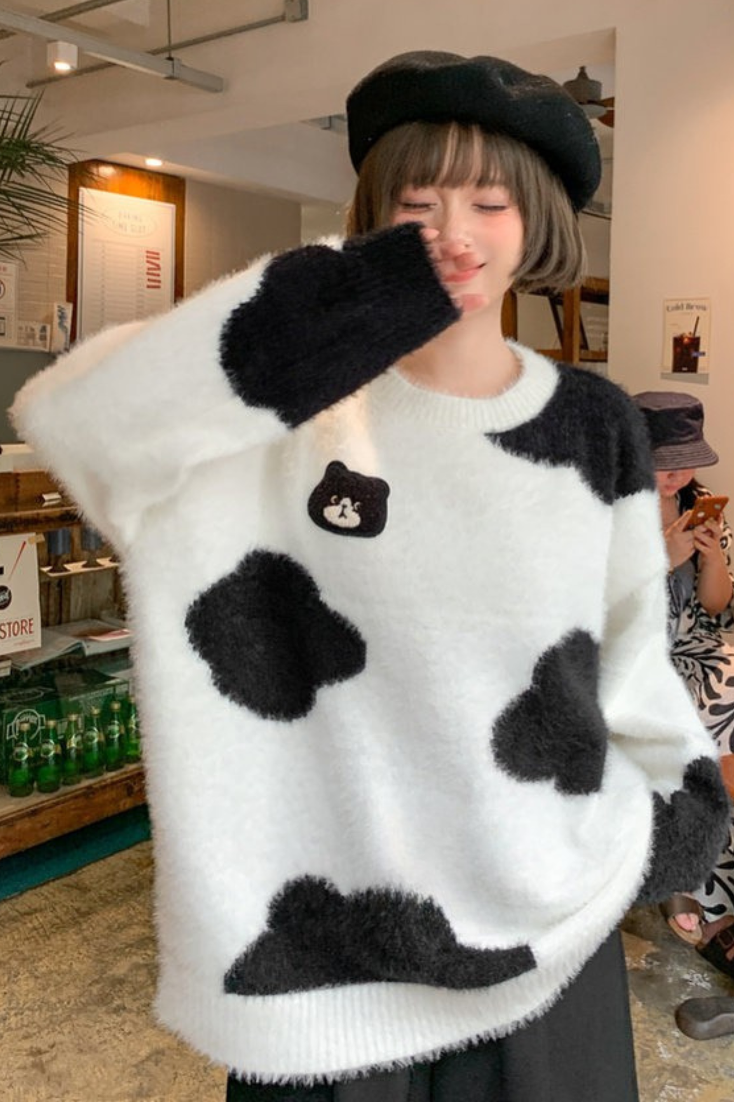 モノクロルーズニットセーター