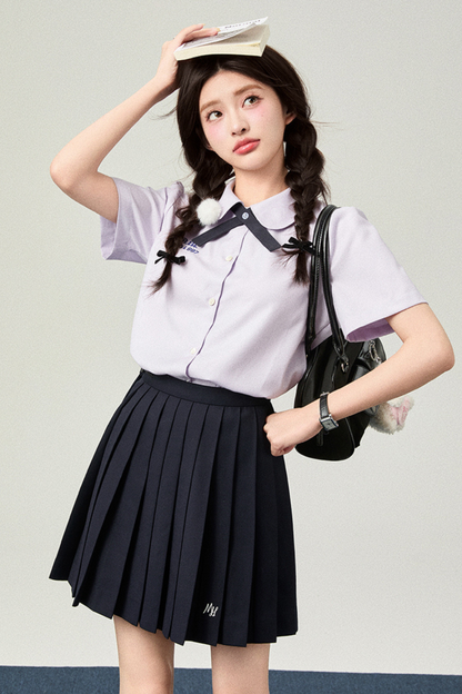 College ribbon tie shirt + pleated skirt