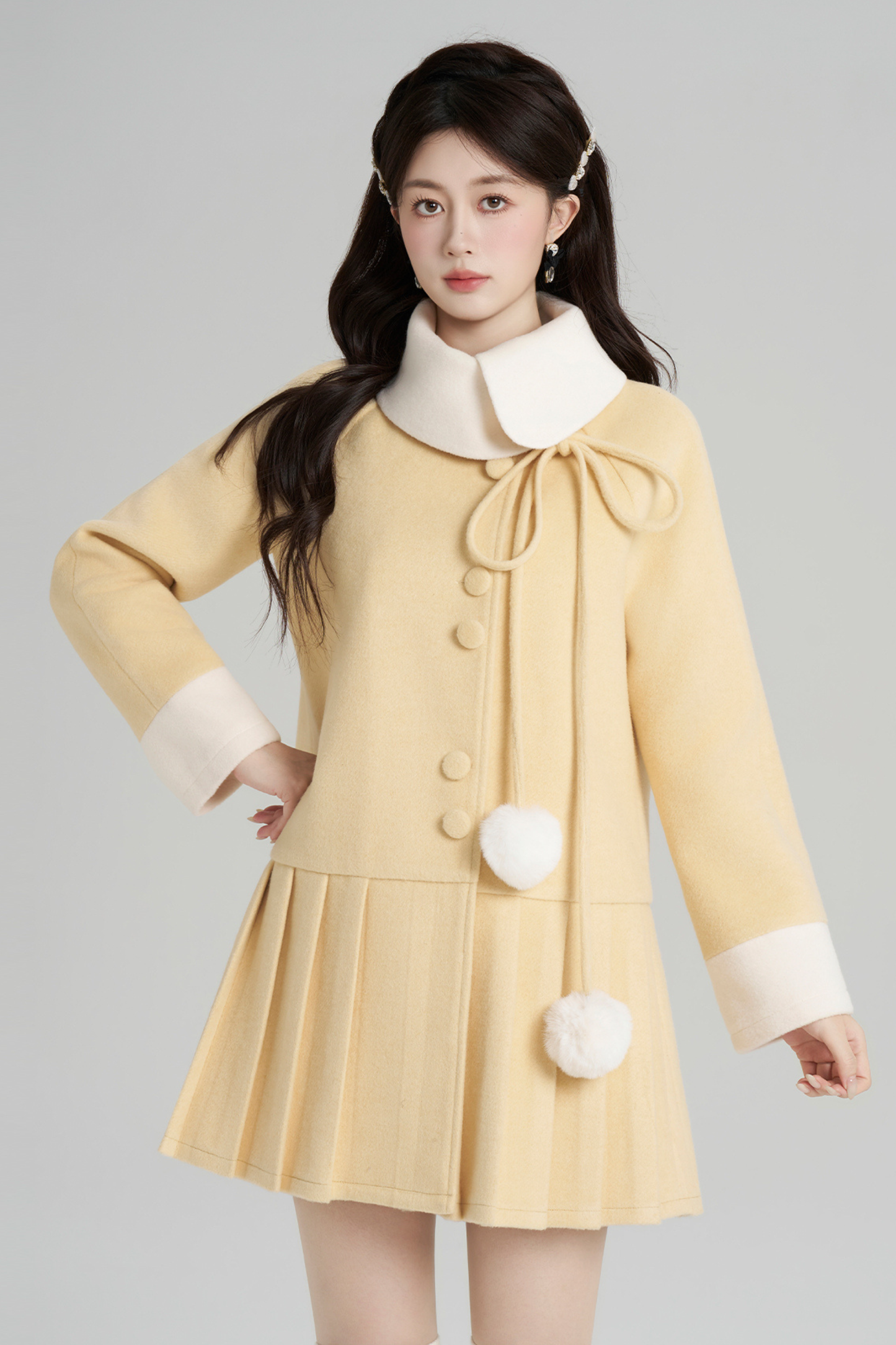 イエロープリーツウールコート