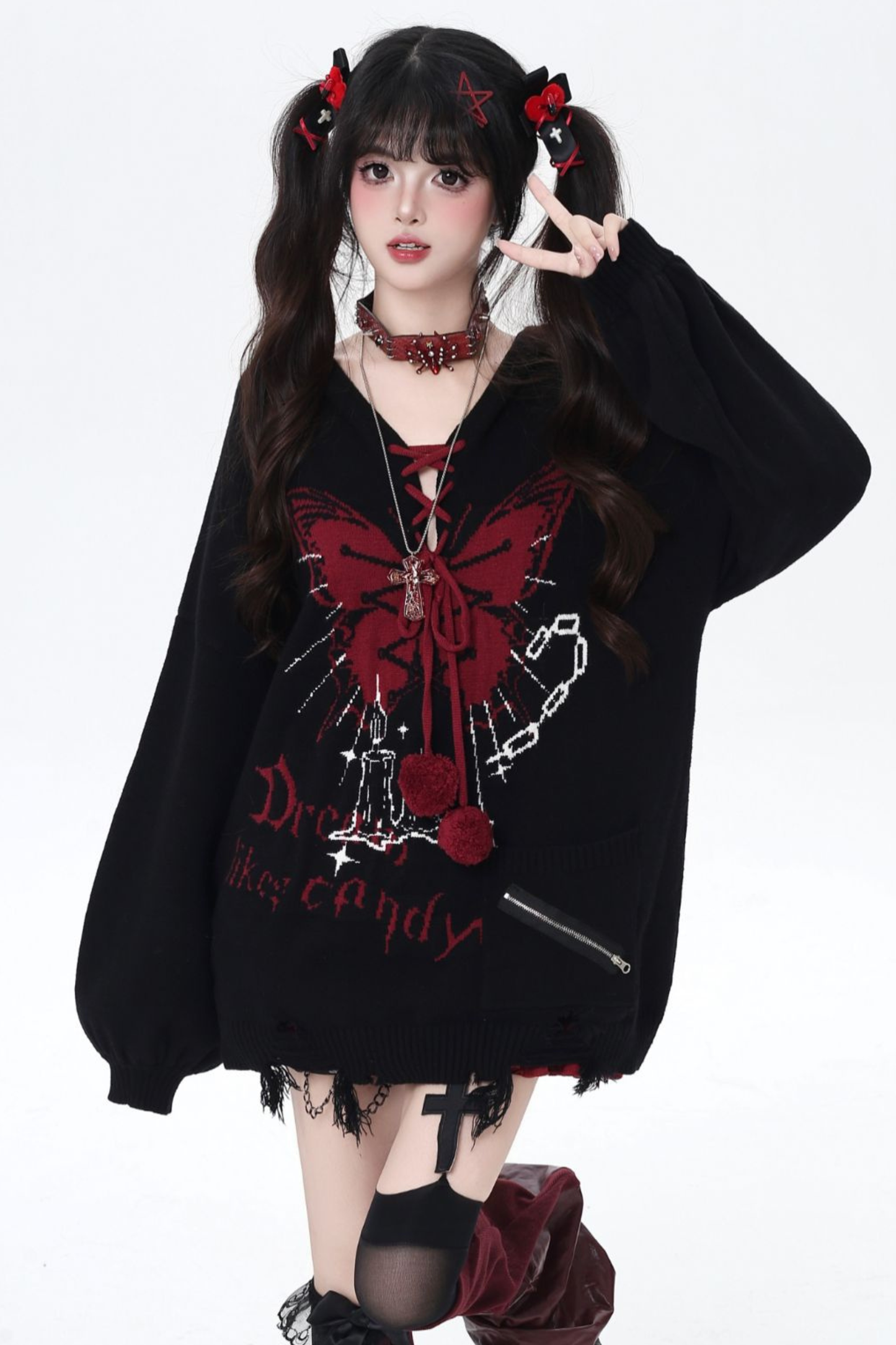 バタフライシャックル Vネックニット