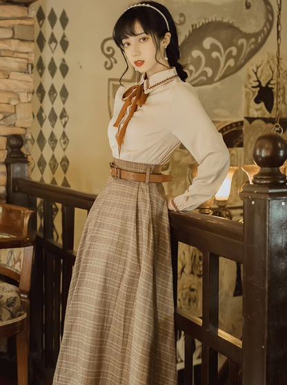 Design color ribbon blouse + check long skirt