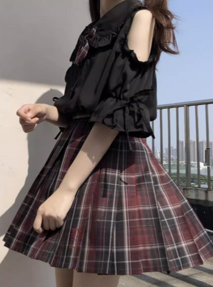 Open shoulder frill shirt + check skirt