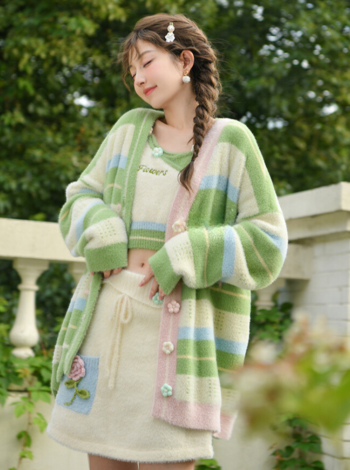 Striped cardigan + fur vest + flower skirt