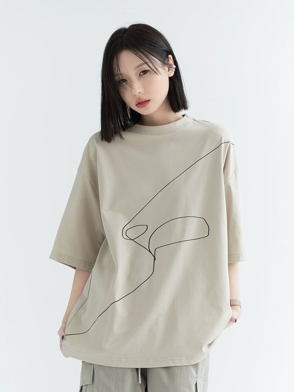 ラインデザインプリントルーズトップス