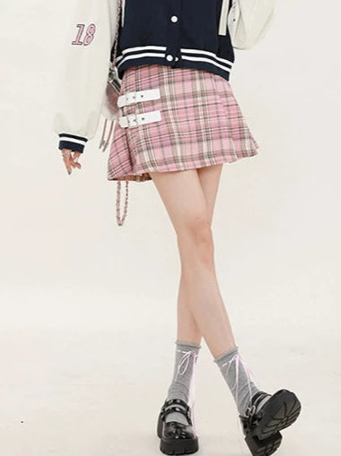 Navy-colored short stadium jacket + checked skirt