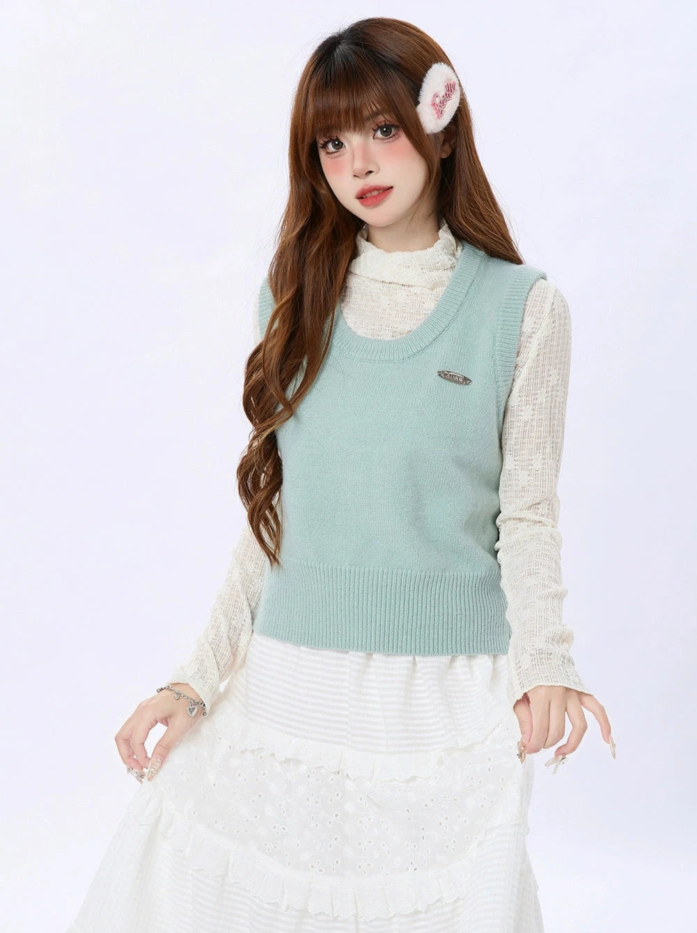 Solid color knit vest