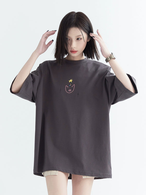 ルーズオーバーワンポイントデザイントップス