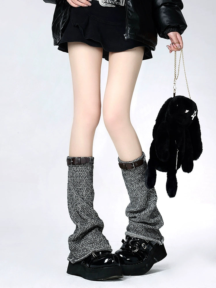 Dark leather buckle leg warmers