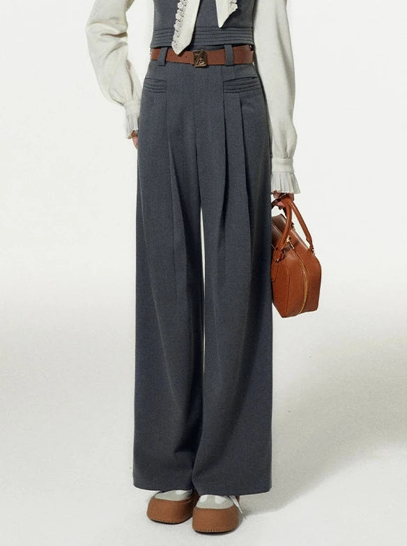 Bow-tie pleated knit shirt + gray vest + slack pants suit