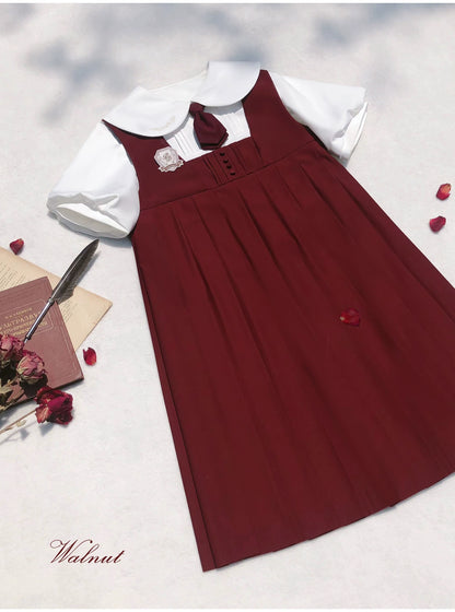 Red burgundy suspender dress + tie + emblem badge