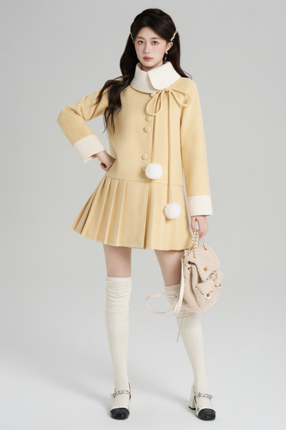 イエロープリーツウールコート