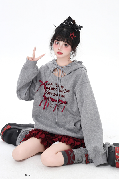 カットアウトリボンフードパーカー