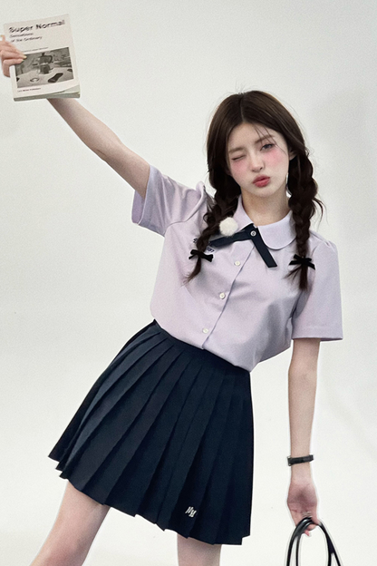 College ribbon tie shirt + pleated skirt
