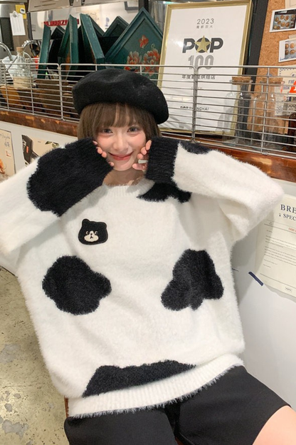 モノクロルーズニットセーター