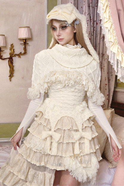 ツイストフリンジニットショートケープ