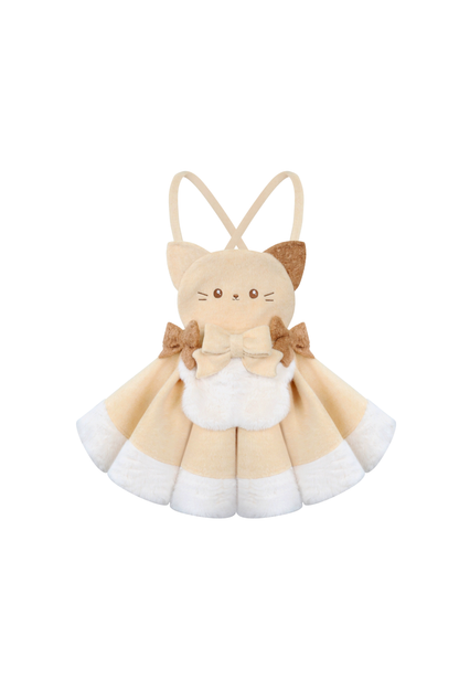 Knit top + kitten suspender skirt with brooch + cape